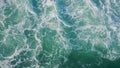 Top rough sea surface waving with foam. Aerial shot stormy ocean waves rippling. Royalty Free Stock Photo