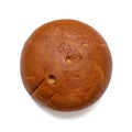 Top view of a round loaf of wheat-rye bread on a white background