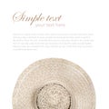 Top view of a round straw hat on a white background.