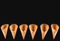 top view of row of appetizing ice cream cones Royalty Free Stock Photo