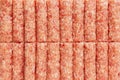 Top view of rows of fresh raw ground meat