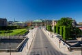 Riksplan green lawn and street with national flags, Stockholm, S