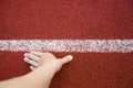 Top view Runner Man Hand in position Track White Lines of Start Running at sport stadium Royalty Free Stock Photo