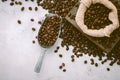 Top view of a sack of coffee beans on a white background with copyspace