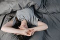 Top view of sad thoughtful insecure young woman cover face with hands, suffers from migraine or depression Royalty Free Stock Photo