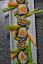Top view on a Salmon Maki Sushi roll prepared during a cooking class
