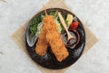 Top view of Salmon tempura sticks is deep fried salmon mixing with tempura flour served with sweet sauce. Royalty Free Stock Photo