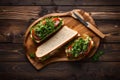 Top view sandwich standing on wooden board