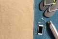 Top view of sandy beach with towel frame and summer accessories. Background with copy space and visible sand texture Royalty Free Stock Photo