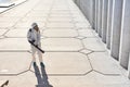 Top view on sanitation worker with pressurized sprayer in hands