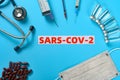 SARS COV 2 surrounded by medical things concept of fighting with the SARS COV 2
