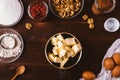 Top view saucepan with diced butter and chocolate