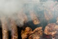 Top view of sausage and meat grilling on barbecue Royalty Free Stock Photo