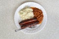 Top view sausages baked beans and mashed potato Royalty Free Stock Photo