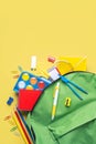 Top view of school backpack and school supplies with space for text. Back to school concept Royalty Free Stock Photo