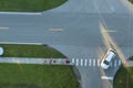 Top view of schoolkids waiting for school bus to arrive in time. Kids standing on suburban street sidewalk ready to be Royalty Free Stock Photo