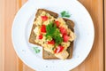 top view of scrambled tofu on whole wheat toast