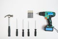 Top view of screwdrivers,hammer, screws, dowels on white backdrop Royalty Free Stock Photo