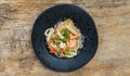 Top View Of Seafood Spicy Glass Noodle Salad Or Spicy Delicious Mung Bean Noodle Salad With Fresh Seafood Yum Woon Sen On Wooden