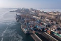 A top view of the seaport container terminal and city.