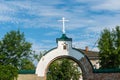 Yuryevets, Russia, July 5, 2023. Entrance gate with a cross to the temple.