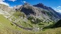 Serpentine road and mountain peaks in Stelvio Pass from Bormio Royalty Free Stock Photo