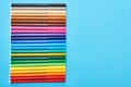 Top view of set of color felt-tip pens isolated on blue. Royalty Free Stock Photo