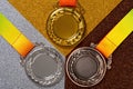 Top view set of gold silver & bronze award medals close up