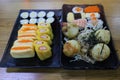 Top view Set Japanese food Sushi on rice Eggs Shrimp Takoyaki Eggs Delicious freshness on a plate on a wooden table