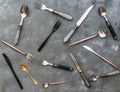 Top view of set silverware on vintage stone background Royalty Free Stock Photo