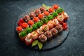 Top view. set of sushi rolls on a black stone plate. Traditional Japanese food. Royalty Free Stock Photo