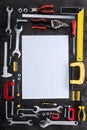 Top view of set of various work tools and blank paper Royalty Free Stock Photo