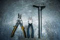 Top view of set working tools lying on metal table Royalty Free Stock Photo