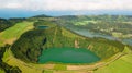 Top view of several beautiful volcanic lakes surrounded by forest, green forests and a long road Royalty Free Stock Photo