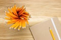 Top-view of several pencils and notebook Royalty Free Stock Photo