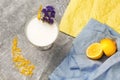 Top view of a shake on a table background. A glass of vanilla milkshake with carambola and flowers. Lemons on a colorful Royalty Free Stock Photo