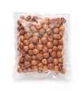 Top view of shelled hazelnuts in transparent plastic bag Royalty Free Stock Photo