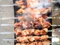 top view of shish kebabs are cooked on brazier