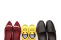 Top view shoes for dad mom and son on white background Royalty Free Stock Photo