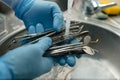 Top view shot of dentist cleaning the dental instruments Royalty Free Stock Photo