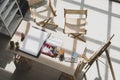 Top view shot of drawing painting artist hobby workshop studio equipment on wooden table including canvas easel stand watercolor Royalty Free Stock Photo