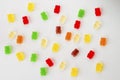 Top view shot of a gummy bear pile on an isolated white surface