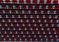 Top view shot of many rows of red and white seats at a sports stadium Royalty Free Stock Photo