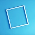 Top view shot of a white frame board on a light blue background