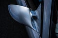 Top view of a side mirror of a grey sports car.. Royalty Free Stock Photo