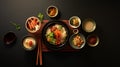 Top view of a simple Asian meal ramen dumplings and sushi illustrating diverse flavors