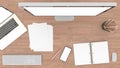 The top view is a simulation of laptops, computers, paper, keyboard, Pencil, pen and Smartphone white screen resting On a wooden t Royalty Free Stock Photo