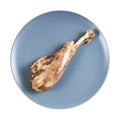 Top view of single boiled turkey leg on blue plate