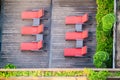 Top view of six red pool bed, beach chair Royalty Free Stock Photo