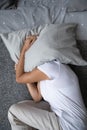 Top view sleepless mature woman lying on bed, insomnia concept Royalty Free Stock Photo